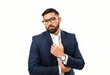 © CS - A confident, well-dressed man in a navy blue suit and white shirt, wearing glasses and a watch, stands against a white background
