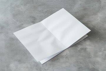 Poster - A simple scene of a folded piece of paper lying on a concrete surface, perhaps lost or forgotten