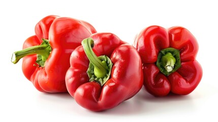 Canvas Print - A cluster of three red bell peppers sit side by side on a plain white background