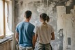 © vasyan_23 - Renovating together: couple paints a room in their home improvement project