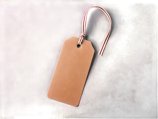 Poster - Light_brown_cardboard_hangtag_with_a_ribbon,_isolated,_ideal_for_product_or_gift_tag_designs.