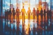 © Vera - group of diverse people silhouettes holding hands in a symbol of unity and inclusion in the workplace.