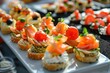 © shobakhul - A white platter with a variety of appetizers, including sandwiches, generative ai image