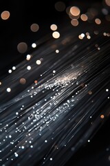 Poster - Close-up view of glowing optical fiber cables emitting light in the dark, highlighting advanced technology and high-speed internet connections