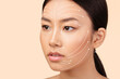 © Prostock-studio - Facial Lifting. Young Beautiful Korean Woman's Face With Uplifting Arrows And Massage Lines On White Background. Advertisement Of Anti Aging Skincare Treatment And Cosmetic Surgery Rejuvenation