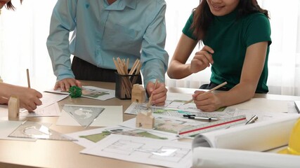 Wall Mural - A video of architect use measurement tools and pencil to measure blueprint. Architect design house construction on a table at studio, with architectural plan scattered around. Focus hand. Delineation.