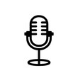© umut hasanoglu - Black and white microphone icon symbolizing broadcast and audio recording on a white background.