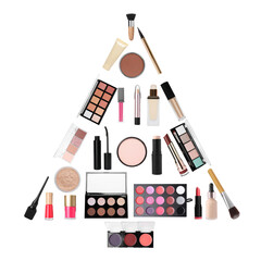 Canvas Print - Christmas tree shape made with different makeup products on white background