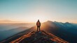 © Phirakhup - A lone figure stands on a mountain peak, surrounded by breathtaking views at sunrise. Nature's beauty and tranquility await discovery.