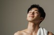 © matoya - Portrait of a Relaxed Young Man with Towel