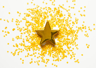 Wall Mural - Shiny gold star with confetti sparkling Falling in vibrant mood for celebration and party concepts.decoration ornaments design background