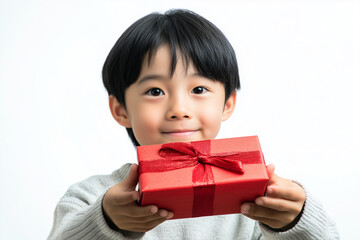 Smiling Boy Holding a Gift