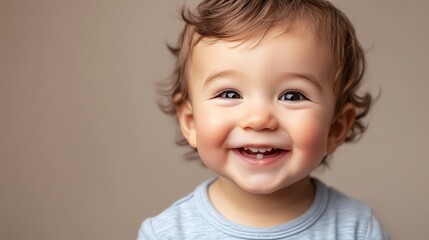 Canvas Print - A baby with blond hair and big blue eyes smiles happily.