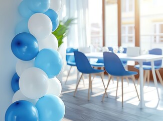 Blue chairs and white table set under a minimalist balloon garland.