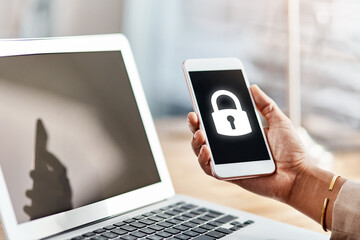 Poster - Hand, smartphone screen and lock icon in office with laptop, display and ux for cybersecurity software. Person, phone and computer with symbol, protection and safety from virus, phishing and hacking