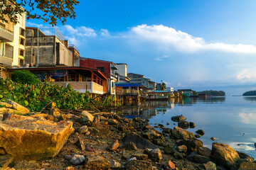 People's houses along the Bang Nara River Narathiwat Province, Thailand.