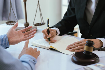 A professional lawyer advises a client in a corporate office, discussing legal documents, contracts, and finance. They consult on justice, legislation, and agreements during an important legal meeting