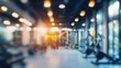 © Sinechana - 80. Abstract blurred image of a fitness gym with soft lighting, modern fixtures, and a variety of exercise machines, creating an active and dynamic environment
