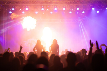 Wall Mural - Crowd at concert and colorful stage lights.