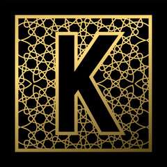 Poster - Letter K is carved in vintage patterned square on black background. Golden monogram in vintage style.