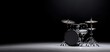 © JP STUDIO LAB - Classic black drum set under spotlight, low-key stage lighting, emphasizing chrome hardware and glossy drum shells, concert performance preparation, cinematic mood