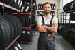 © Serhii - Auto mechanic recommend tire to choose for car