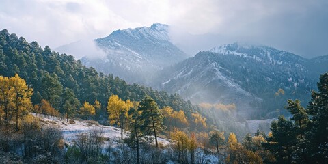 Wall Mural - mountain range touched by early snow