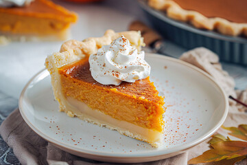 Sticker - Orange slice of traditional pumpkin pie with cream on plate