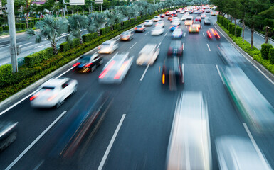 Wall Mural - Fast moving traffic in city evening