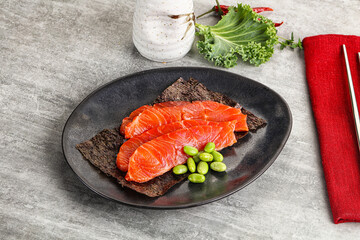 Sliced salmon sashimi in the plate