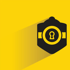 Sticker - shield icon with shadow on yellow background