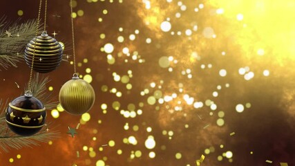 Wall Mural - Swinging black and gold christmas baubles and confetti over bokeh white and yellow light spots