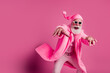 © deagreez - Photo of optimistic cool funny old man wear stylish bathrobe have fun valentine day event isolated on pink color background