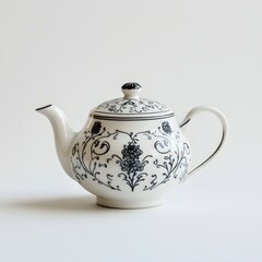 Wall Mural - 135. A delicate porcelain teapot with intricate design isolated on a clean white background