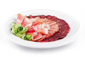 Wall Mural - Plate presenting delicious cured meat slices with cucumber decoration