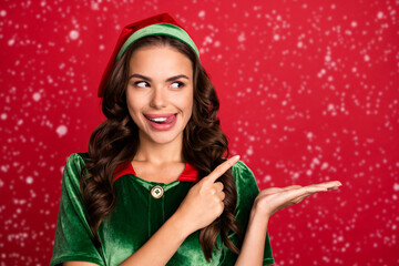 Canvas Print - Photo portrait female elf pointing finger copyspace licking lips isolated vivid red color background copyspace