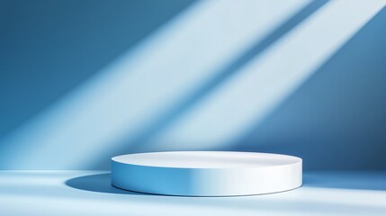 Poster - A smooth, white circular pedestal on a blue background with soft shadows and light rays illuminating the space