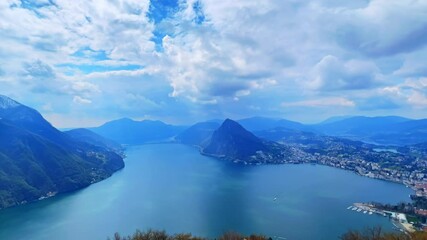 Canvas Print - Timelapse of fast clouds over Lake Lugano and Monte San Salvatore, Switzerland