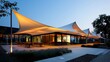 © Suthathip - Tensile fabric structure for outdoor events: A sleek tensile fabric structure stretches across an outdoor space, providing shelter and shade for events with its elegant, modern design.