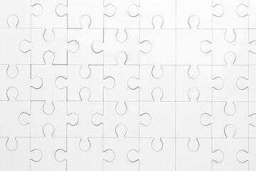 Sticker - White puzzle as background, top view. Intellectual game