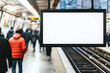© tonstock - Empty billboard in a busy subway station with blurred pedestrians, perfect for advertising mockups and commercial designs.
