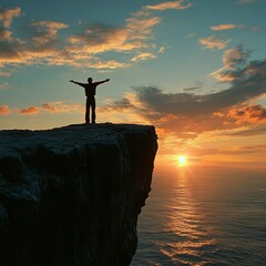 Canvas Print - Silhouette of a person on a cliff during a vibrant sunset.