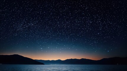 Wall Mural - milky way galaxy shining over mountains and lake at night