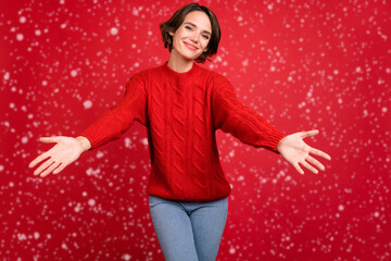 Poster - Photo portrait young woman embracing with opened hands isolated vivid red color background