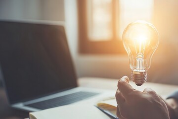 Poster - Businessman accountant holding light bulb with innovative concept