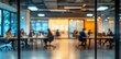 © Zaleman - A blurry office with a glass wall and people working behind it