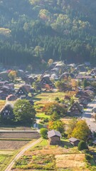 Sticker - Shirakawago village Gifu Japan time lapse of Gassho house at Shirakawa village in autumn season (Vertical)