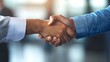 © pjjaruwan - Two professionals exchanging firm handshakes after negotiating a partnership deal, partnership agreement, successful outcome