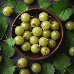 Canvas Print - Fresh gooseberry fruits on dark background. Top view