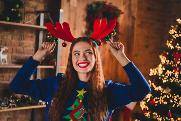 Wall Mural - Photo of cheerful positive girl wear blue sweater tradition new year fun dance party indoors